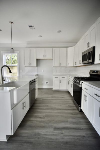 Furnished interior view inside a new home in , North Charleston (Image 11).
