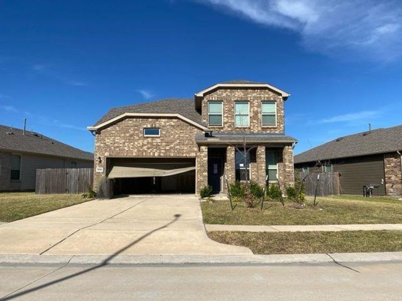 Front exterior of a new home in Myrtle Gardens, Magnolia, TX, highlighting curb appeal (Image 2). Front exterior of a new home in Myrtle Gardens, Magnolia, TX, highlighting curb appeal (Image 2).