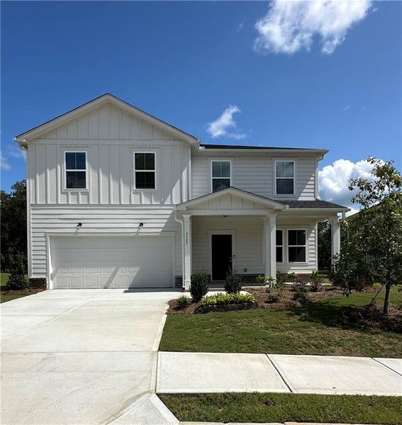 Front exterior of a new home in Avery Ridge, Gainesville, GA, highlighting curb appeal (Image 1).