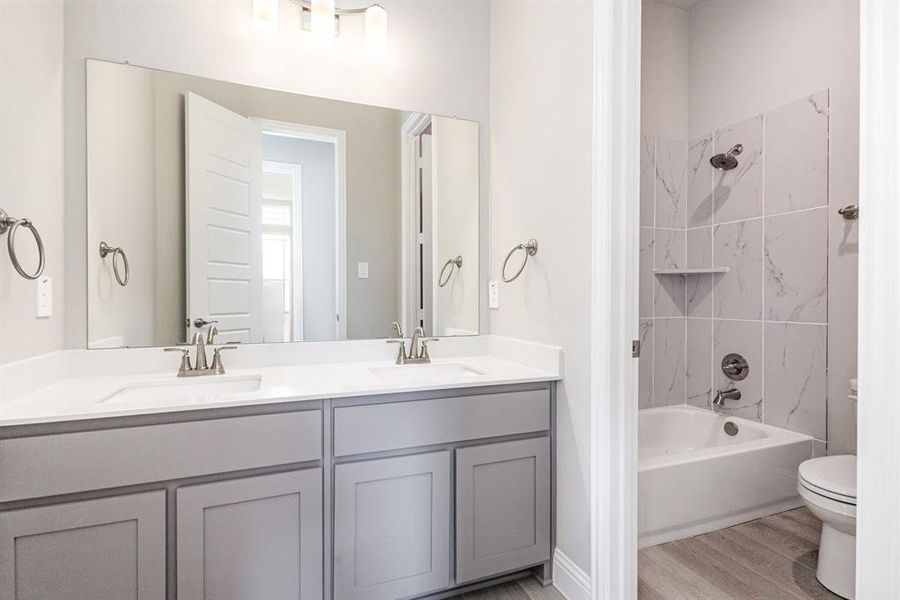 Furnished interior view inside a new home in Ten Mile Creek Estates, DeSoto (Image 8).