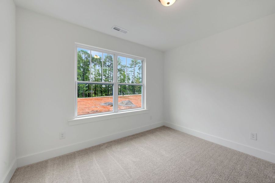 Spacious, unfurnished interior of a new home in Ashmore Townes, Garner (Image 31). Spacious, unfurnished interior of a new home in Ashmore Townes, Garner (Image 31).