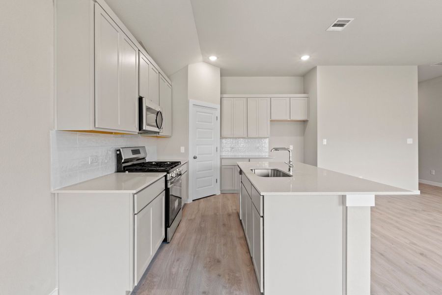 Representative furnished interior of a home built from the Nueces by Trophy Signature Homes in Prairie Winds, Hutto (Image 11).