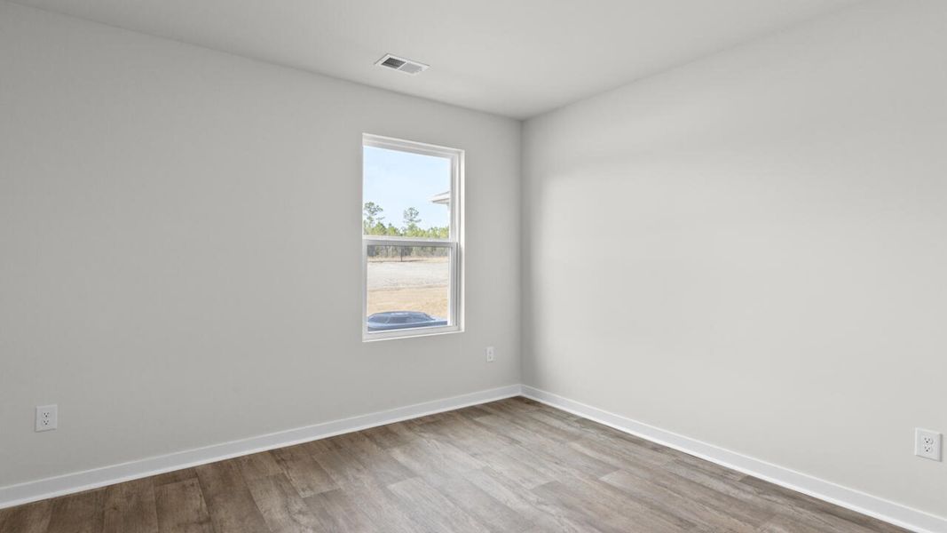 Spacious, unfurnished interior of a new home in Sidbury Station, Castle Hayne (Image 17).