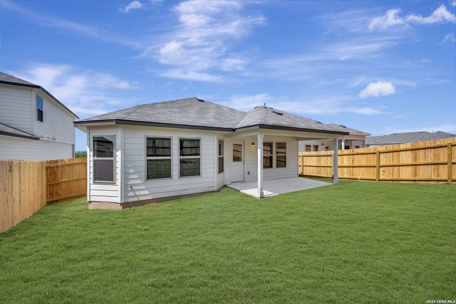 Exterior details and patio area of a home in Mesquite Ridge, San Antonio (Image 31).