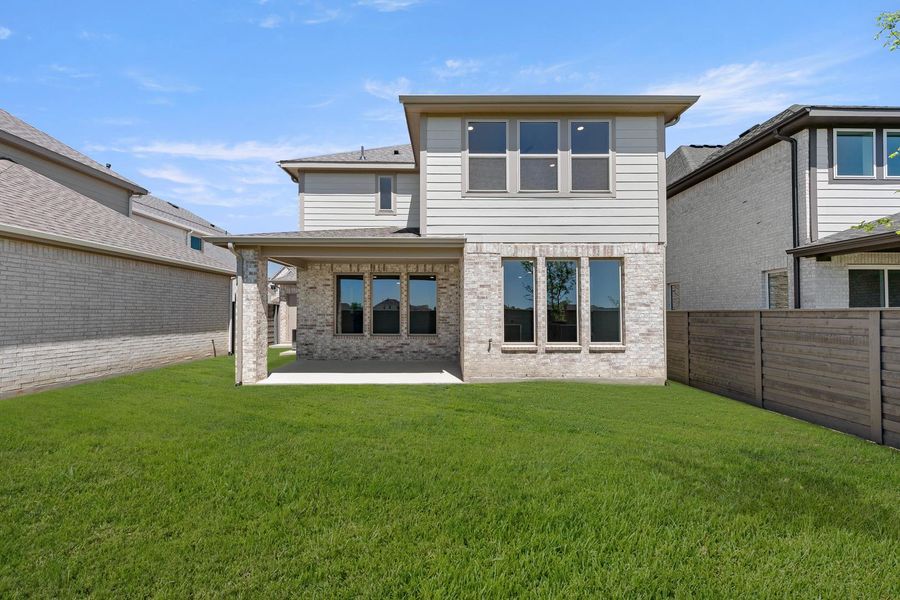 Exterior details and patio area of a home in Union Park, Little Elm (Image 4).
