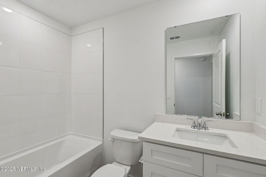 Furnished interior view inside a new home in Azalea Creek, Jacksonville (Image 6). Furnished interior view inside a new home in Azalea Creek, Jacksonville (Image 6).