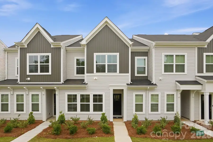 Front exterior of a new home in Sloan Station, Charlotte, NC, highlighting curb appeal (Image 1). Front exterior of a new home in Sloan Station, Charlotte, NC, highlighting curb appeal (Image 1).