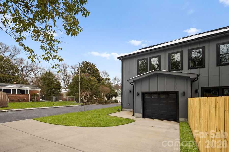 Front exterior of a new home in , Charlotte, NC, highlighting curb appeal (Image 26).