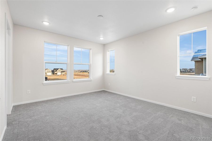 Spacious, unfurnished interior of a new home in Barefoot Village, Firestone (Image 14).