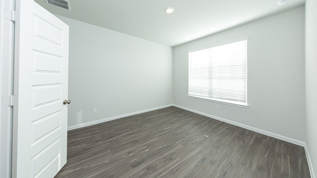 Representative unfurnished interior of a home built from the The Hawthorn by Legend Homes in Rocky Creek Crossing, Crowley (Image 13).