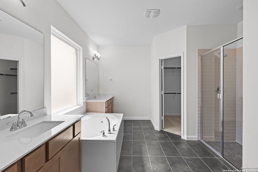 Furnished interior view inside a new home in Megan's Landing 50', Castroville (Image 11).