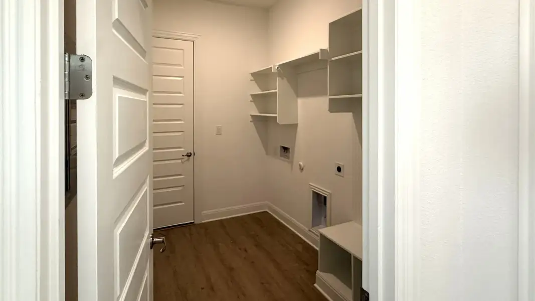 Furnished interior view inside a new home in Flora, Hutto (Image 6).