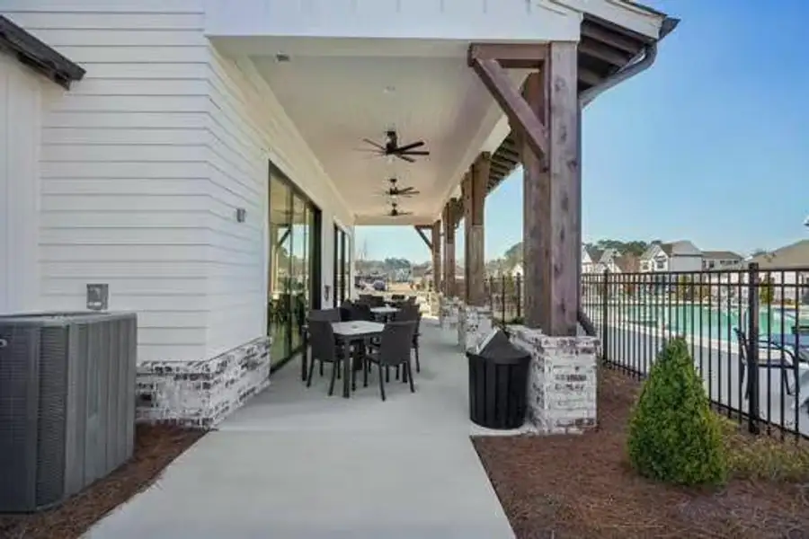 Exterior details and patio area of a home in Promenade at Sawnee Village, Cumming (Image 3).