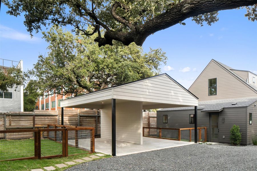 Exterior space featuring a carport