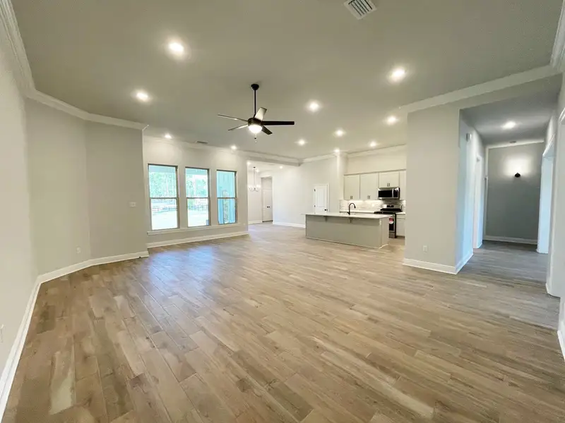 Front exterior of a new home in Iron Rock, Cantonment, FL, highlighting curb appeal (Image 4).
