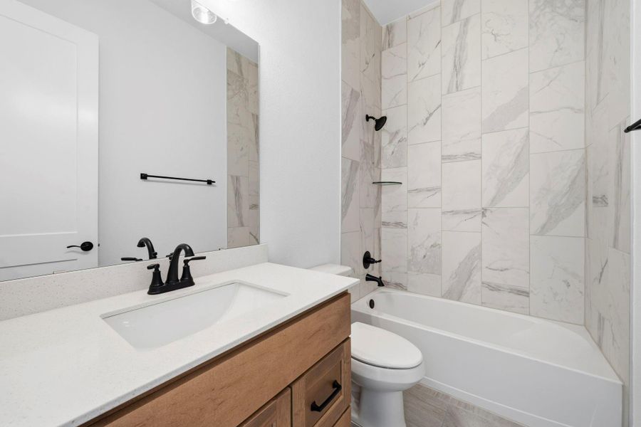 Furnished interior view inside a new home in The Trails, New Caney (Image 9).