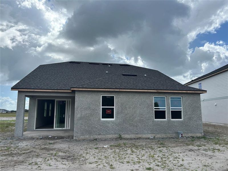 In-progress construction of a new home in Oakfield Trails Signature, Parrish, FL (Image 21).