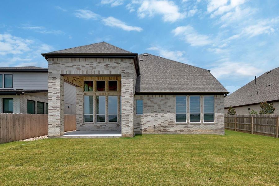 Exterior details and patio area of a home in Santa Rita Ranch, Liberty Hill (Image 15).
