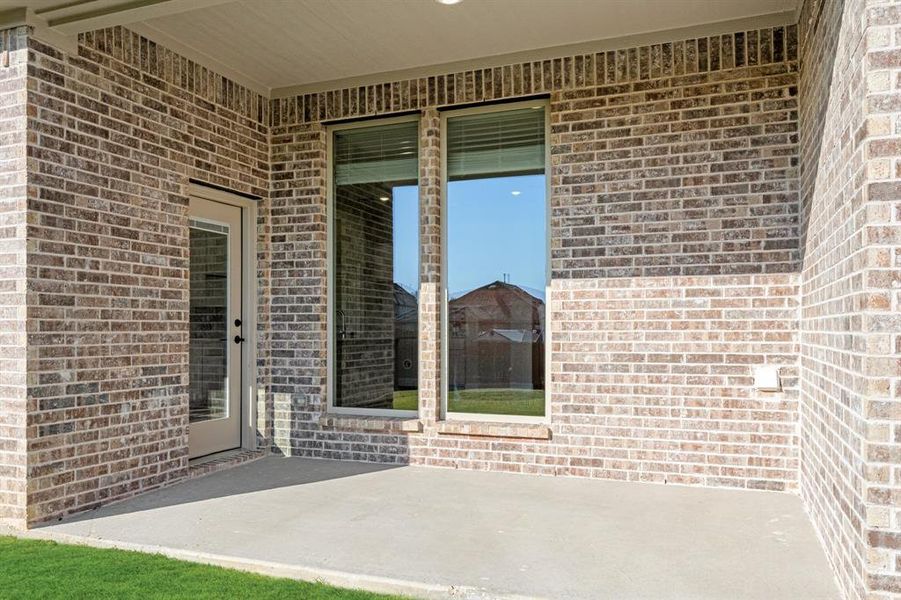 Exterior details and patio area of a home in Godley Ranch Classic, Godley (Image 3).