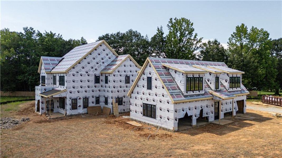 Front exterior of a new home in , Milton, GA, highlighting curb appeal (Image 18).