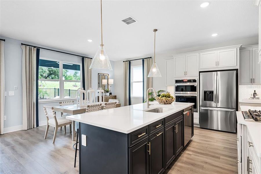Furnished interior view inside a new home in Eden Crest, Apopka (Image 3).