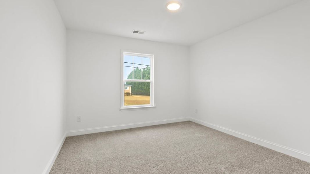 Representative unfurnished interior of a home built from the Interior Unit by D.R. Horton in Pearson Road Townhomes, Easley (Image 24).