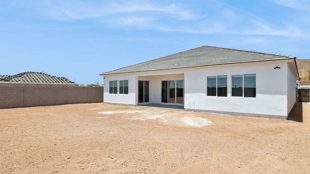 Exterior details and patio area of a home in The Ridge at Stone Butte, Phoenix (Image 2).