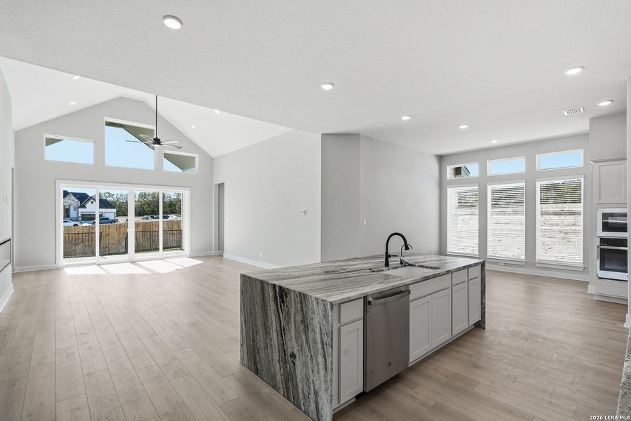 Furnished interior view inside a new home in Potranco Oaks, Castroville (Image 6).