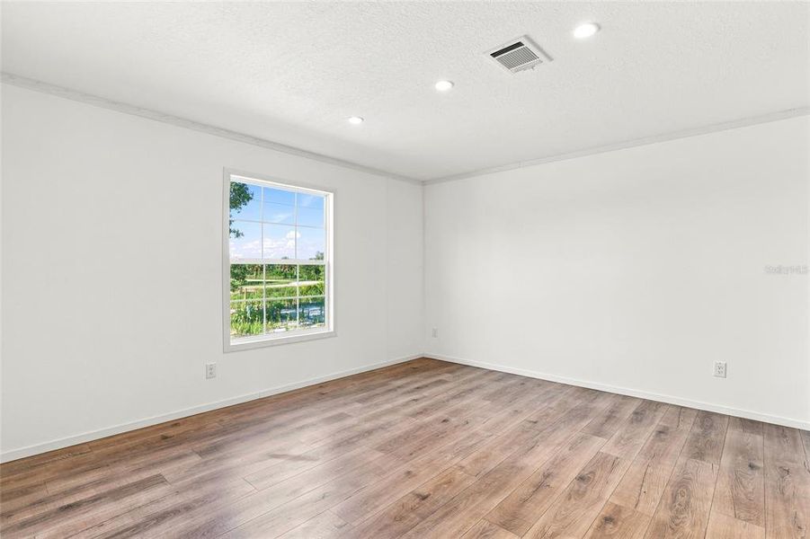 Spacious, unfurnished interior of a new home in , Okeechobee (Image 31).