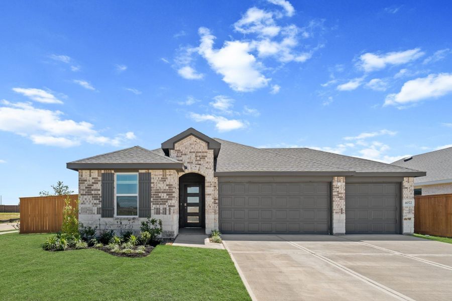 Front exterior of a new home in Sunterra Lakes, Brookshire, TX, highlighting curb appeal (Image 2). Front exterior of a new home in Sunterra Lakes, Brookshire, TX, highlighting curb appeal (Image 2).
