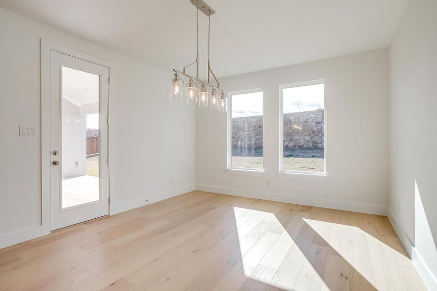 Representative unfurnished interior of a home built from the Eleanor by Graham Hart Home Builder in Sweetgrass, Haslet (Image 22).