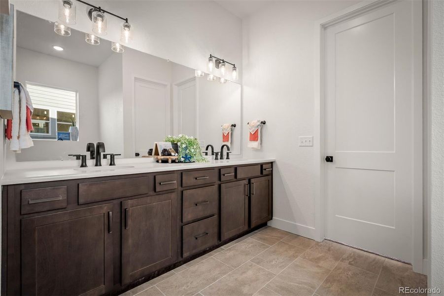 Furnished interior view inside a new home in Revel Crossing at Wolf Ranch - The Panorama Collection, Colorado Springs (Image 9).