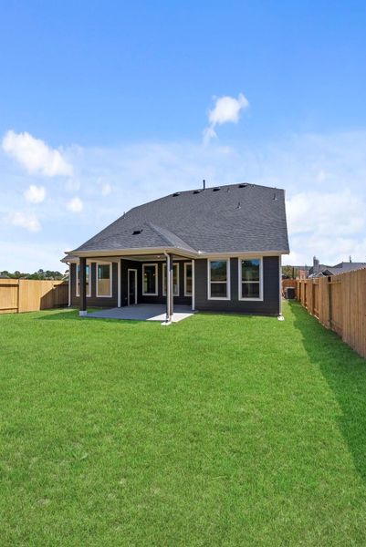 Exterior details and patio area of a home in Trinity Grove, Spring (Image 19). Exterior details and patio area of a home in Trinity Grove, Spring (Image 19).