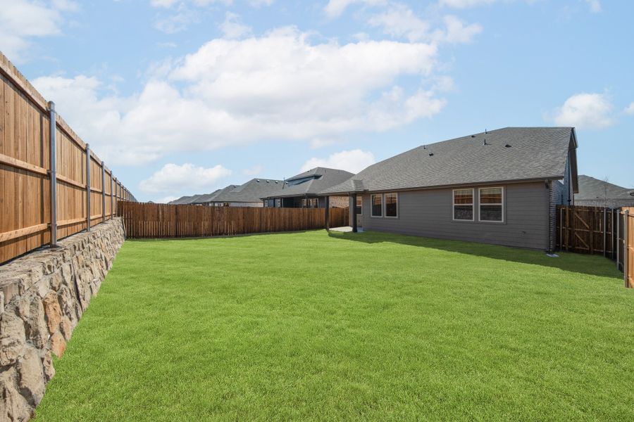Exterior details and patio area of a home in Verandah, Royse City (Image 2).