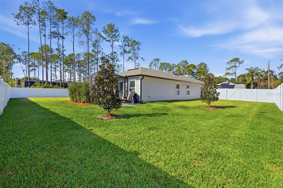 Exterior details and patio area of a home in Palm Coast Homesites, Palm Coast (Image 3).