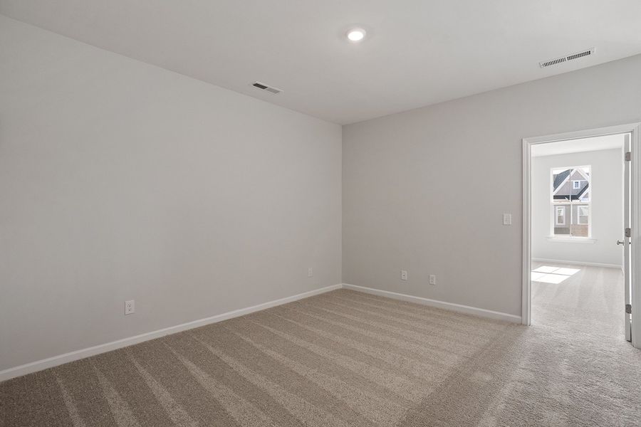 Spacious, unfurnished interior of a new home in Ovation at Sweetbrier, Durham (Image 26).