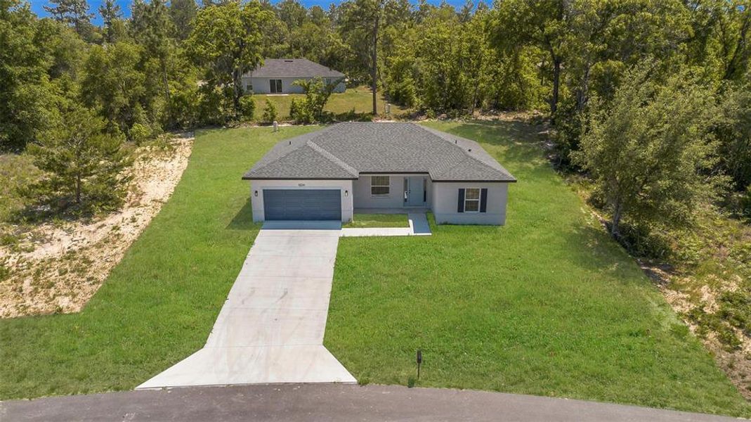 Front exterior of a new home in , Ocala, FL, highlighting curb appeal (Image 28).