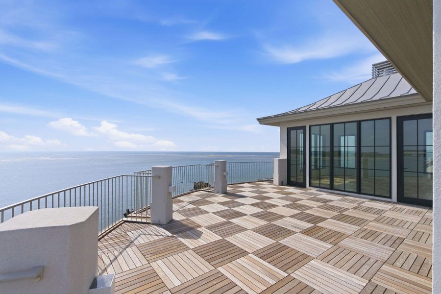 Exterior details and patio area of a home in , Sullivan's Island (Image 35).