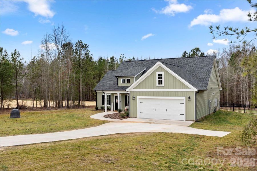 Front exterior of a new home in , Clover, SC, highlighting curb appeal (Image 22). Front exterior of a new home in , Clover, SC, highlighting curb appeal (Image 22).