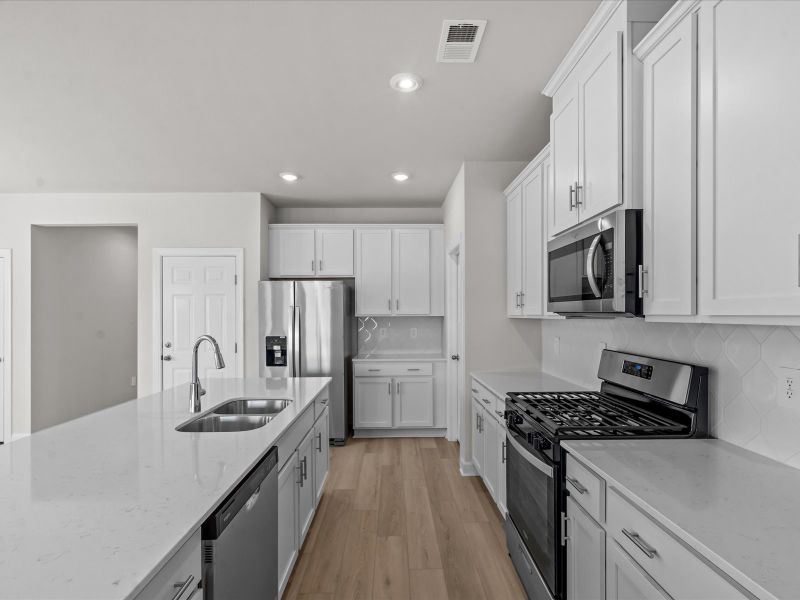 Furnished interior view inside a new home in The Farm at Wells Creek - Heritage Collection, Gray Court (Image 4).