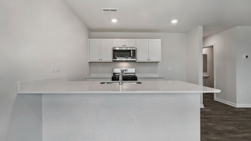 Furnished interior view inside a new home in The Townes at Honeycutt Oaks, Angier (Image 9).