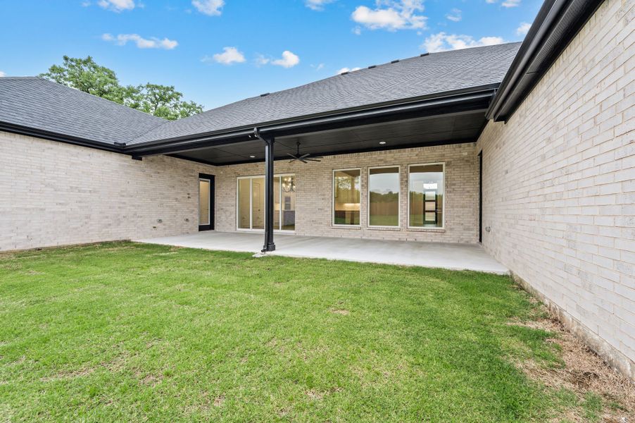 Exterior details and patio area of a home in Highland Oaks, Boyd (Image 4). Exterior details and patio area of a home in Highland Oaks, Boyd (Image 4).