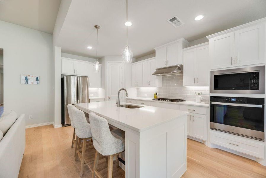 Furnished interior view inside a new home in Reunion, Rhome (Image 11).