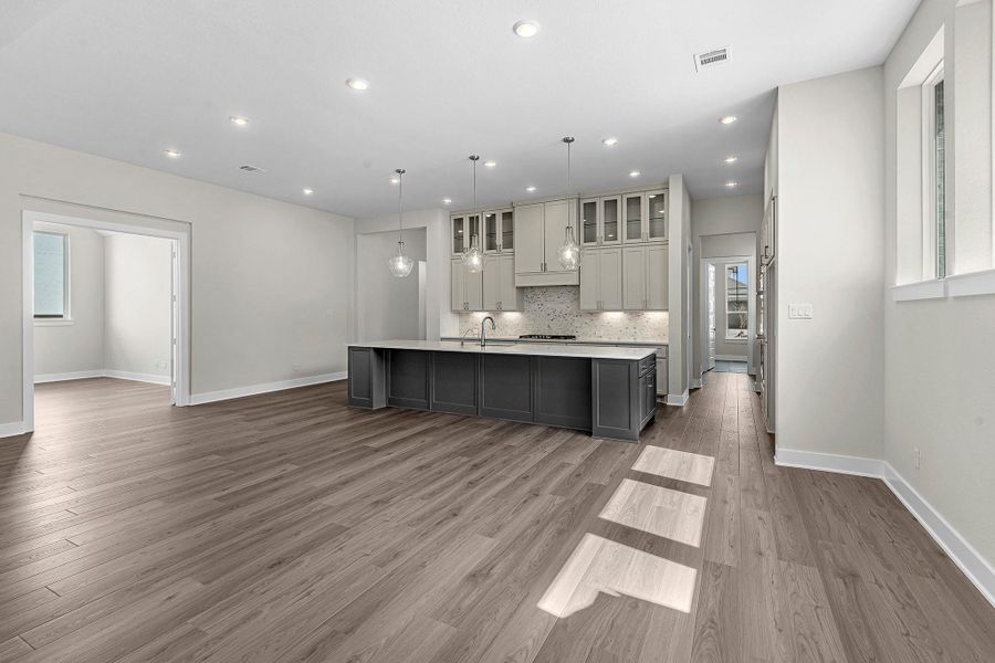 Furnished interior view inside a new home in Bridgeland, Cypress (Image 18).