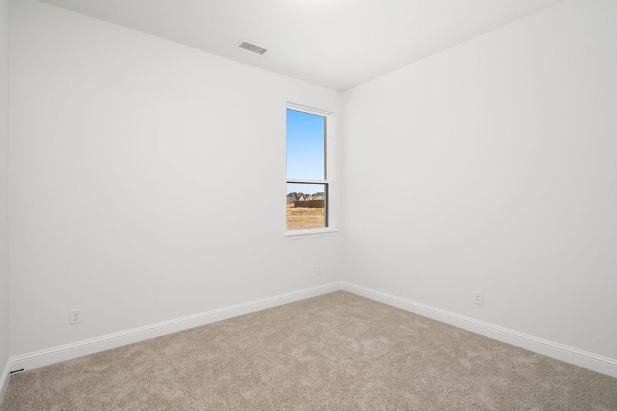 Spacious, unfurnished interior of a new home in Cambridge Crossing, Celina (Image 32).