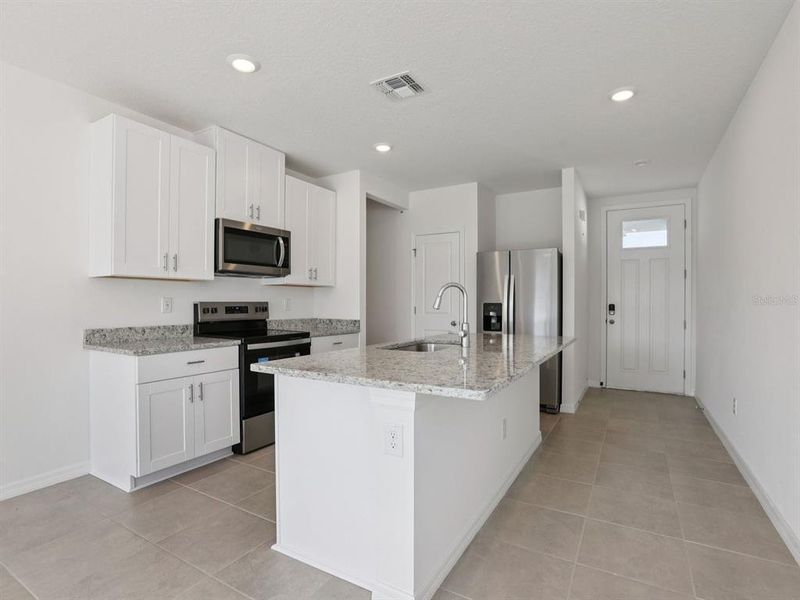 Furnished interior view inside a new home in Benton Hills - Premier Series, Brooksville (Image 6).