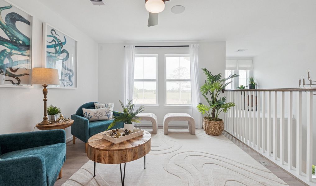 Loft open to below with nearby plant shelf Loft open to below with nearby plant shelf