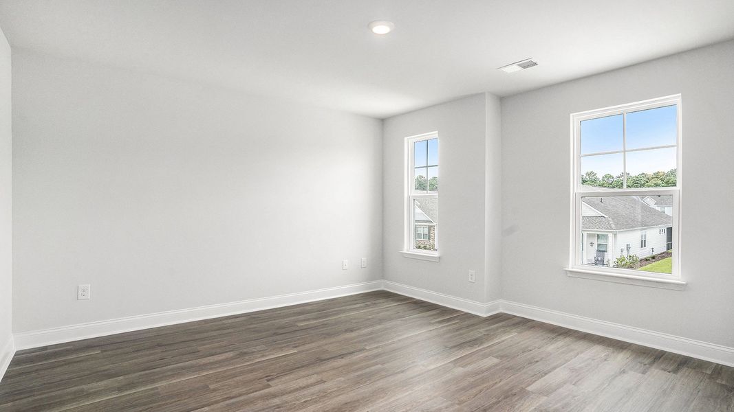 Spacious, unfurnished interior of a new home in The Preserve at Shaftesbury Glen, Conway (Image 6).