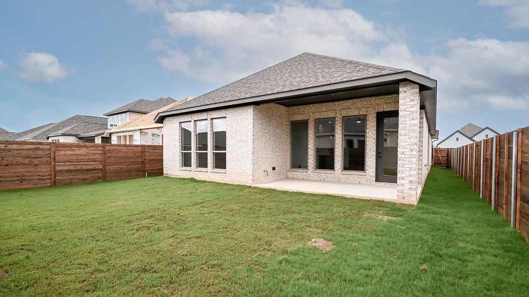 Exterior details and patio area of a home in Juniper Springs, Lockhart (Image 4).