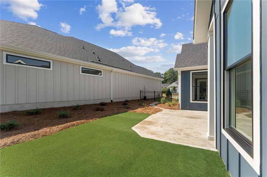 Front exterior of a new home in The Courtyards at Redbud Lane, Canton, GA, highlighting curb appeal (Image 20).